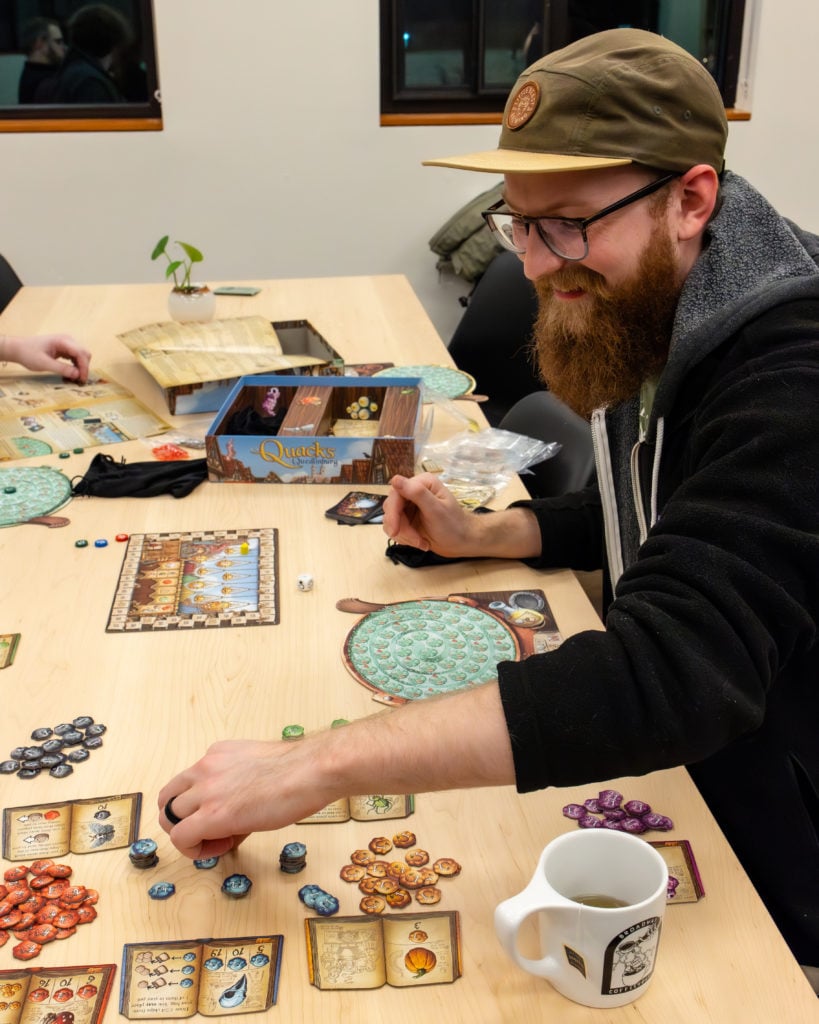 playing board games at tabletop loft at broadway coffeehouse