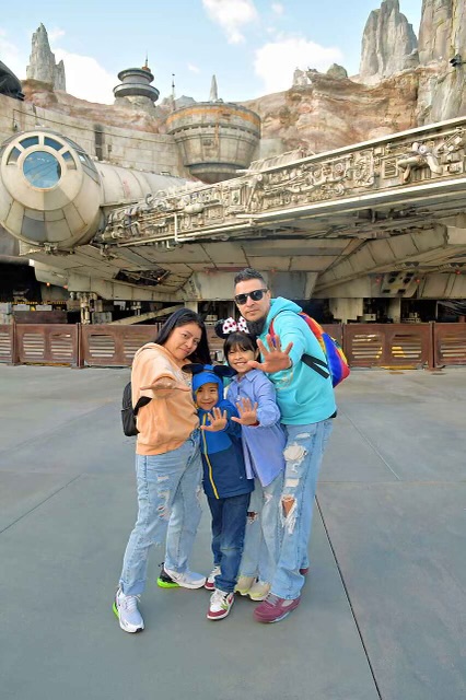 Christian, wife, and children at Disneyland - Star Wars Theme Park.
