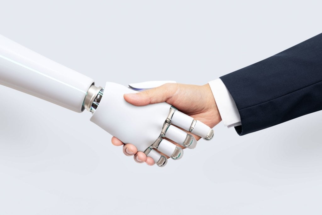 Handshake with robot AI marketing concept