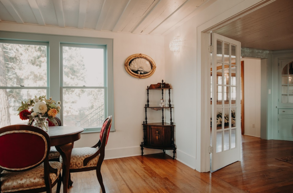 Inside Governor's House with original hardwood floors and French doors 