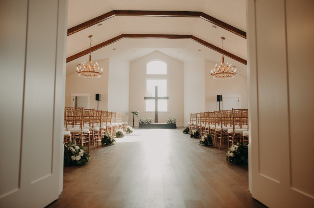 Inside chapel with traditional wedding set up