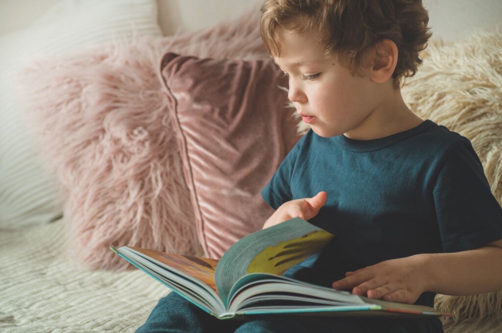 child reading at home