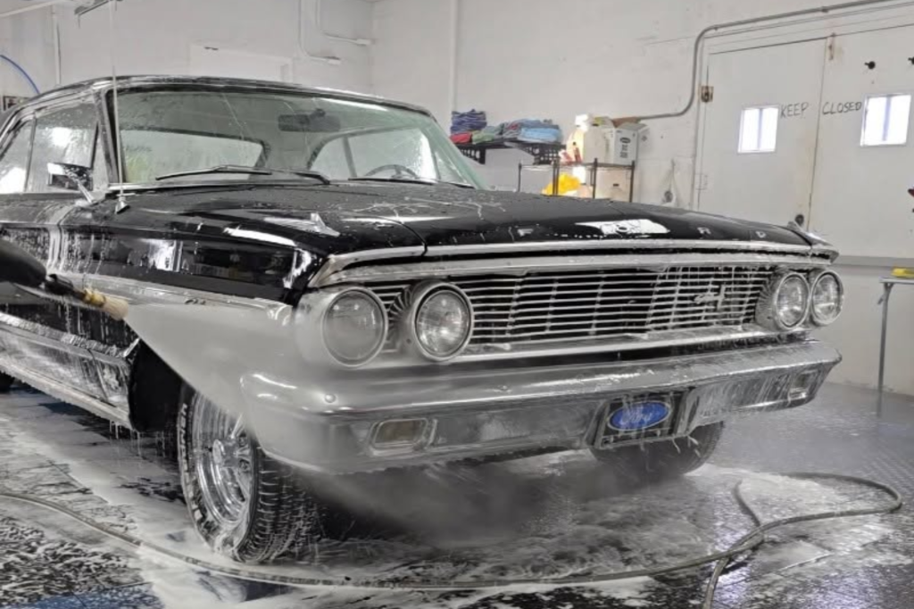 Classic car receiving professional detailing wash