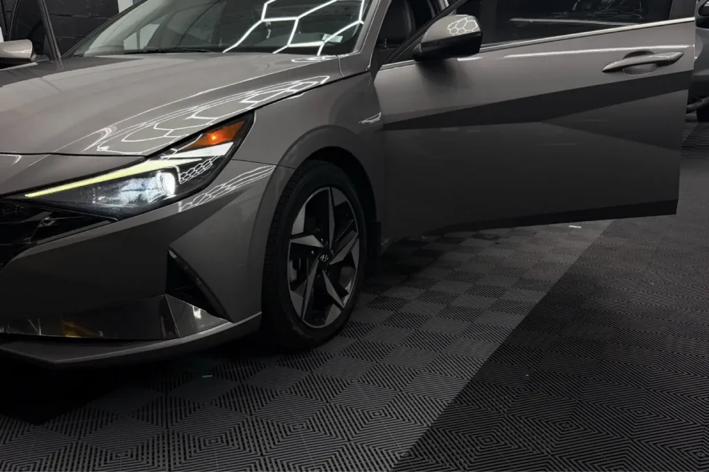 Glossy grey Hyundai sedan showcasing results of professional ceramic coating in Jacksonville, FL.