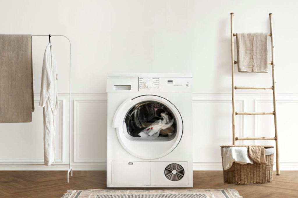 Durable laundry countertop in Richmond featuring front-load washing machine and organized storage area.