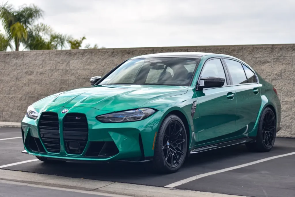 Green BMW M3 sedan with paint protection film in Loma Linda applied to the body.
