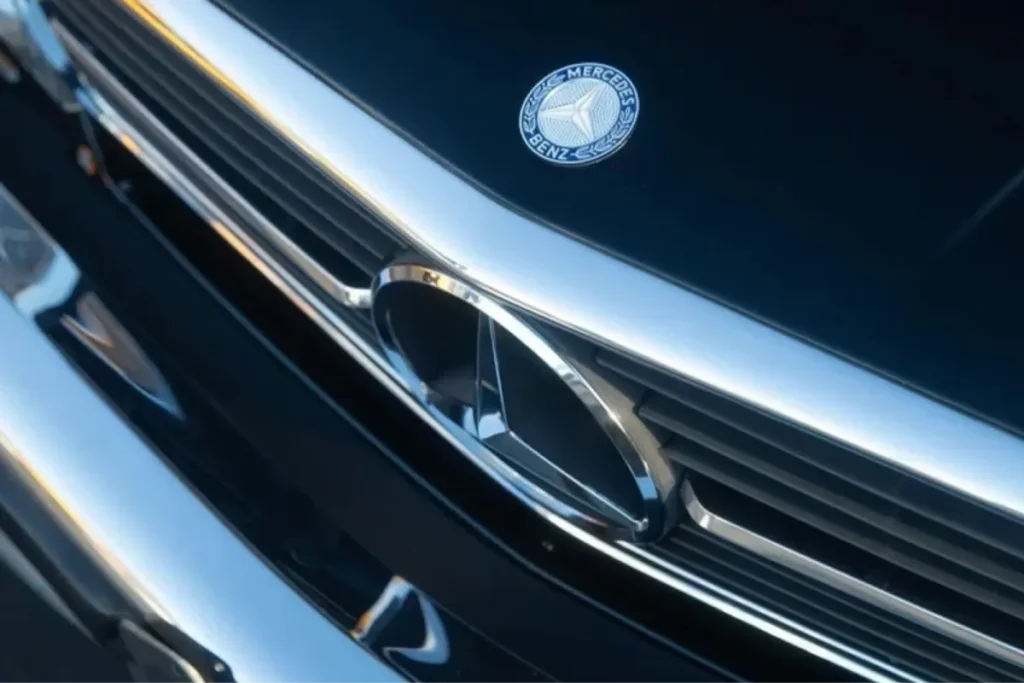 Close-up of a Mercedes-Benz grille protected by glossy paint protection film.