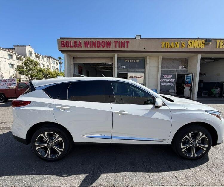 How Does Automotive Window Tinting Reduce Cabin Heat Without Making Windows Extremely Dark